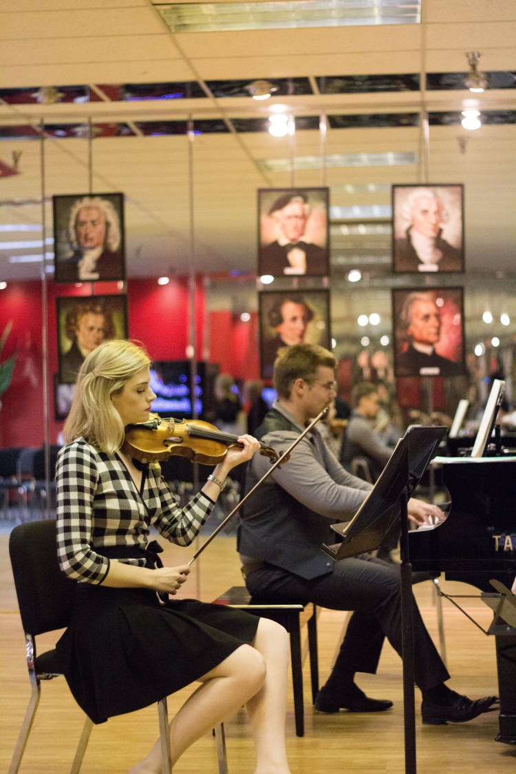 Lauren listens as David takes it away in the Brahms